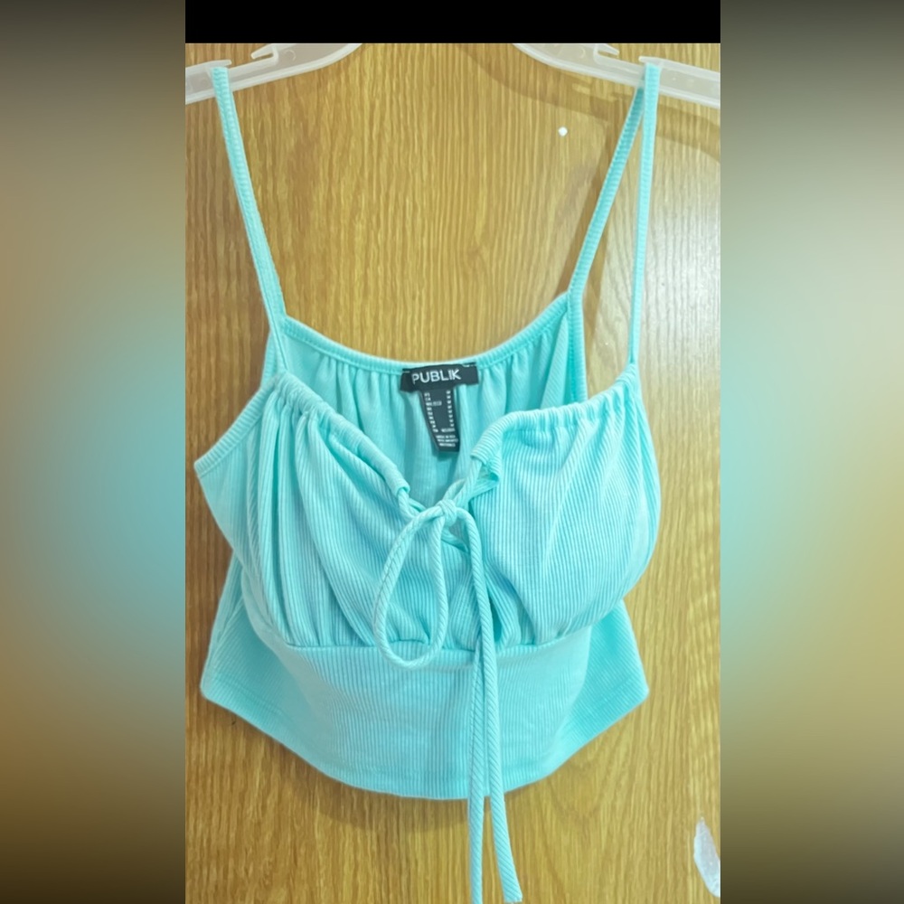 Publix light blue crop top, New without tags, adjustable above cup area.
